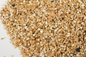 Pearl barley heap isolated on white