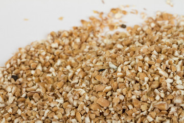 Pearl barley heap isolated on white