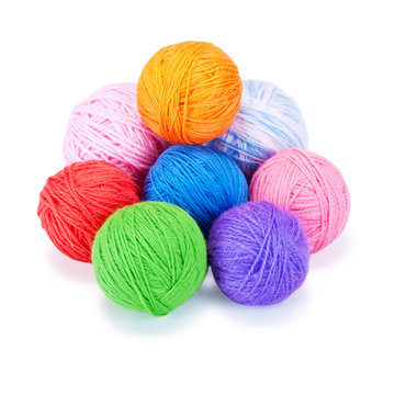 Several multi-colored woolen balls