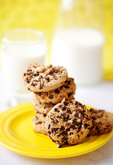 cookies with chocolate and glass of milk