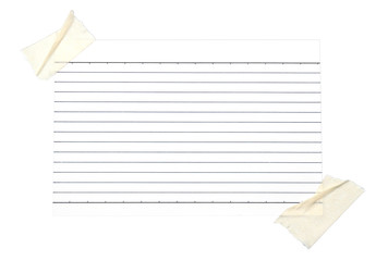 piece of lined paper stuck with tape
