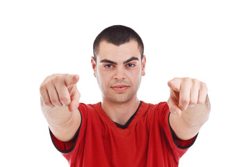Fototapeta premium Portrait of young man pointing at you