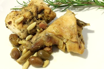 coniglio alla ligure con olive e pinoli