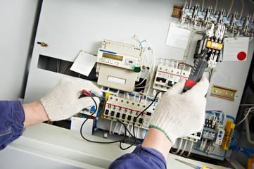 Close-up Hands of Electrician measure voltage