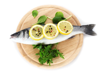 Fresh fish with lemon, parsley and pepper