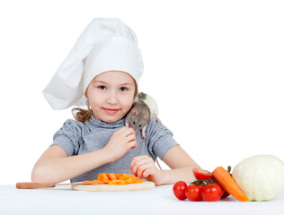 Chef girl preparing healthy food. Helper rat sitting and eating