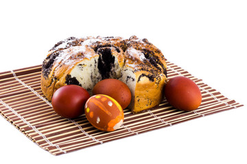 general plan for the Easter eggs and cake on the mat isolate