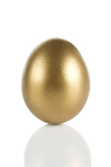 Golden egg isolated on white background