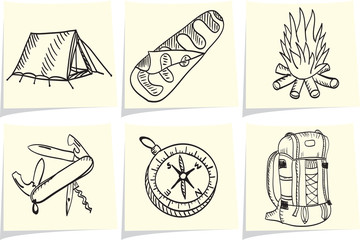 Set of camping and outdoor equipment on yellow memo sticks