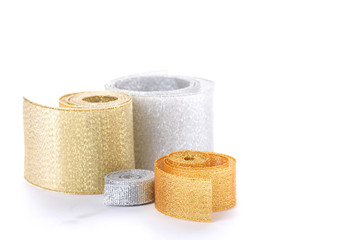 beautiful golden and silver ribbons isolated on white