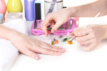 Manicure process in beautiful salon
