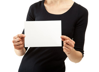 Woman's hands holding blank sheet of paper