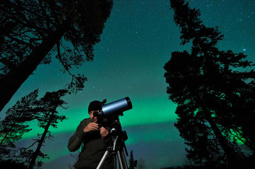 Man and telescope