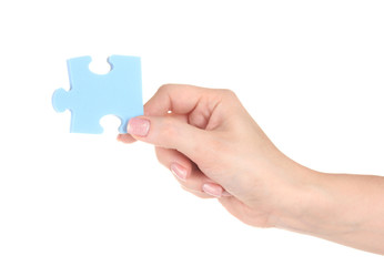 Blue puzzle with a hand isolated on white