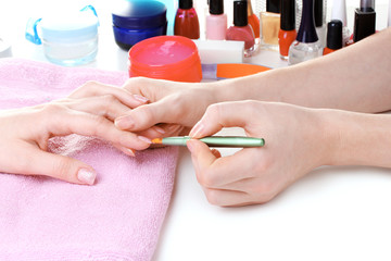Manicure process in beautiful salon