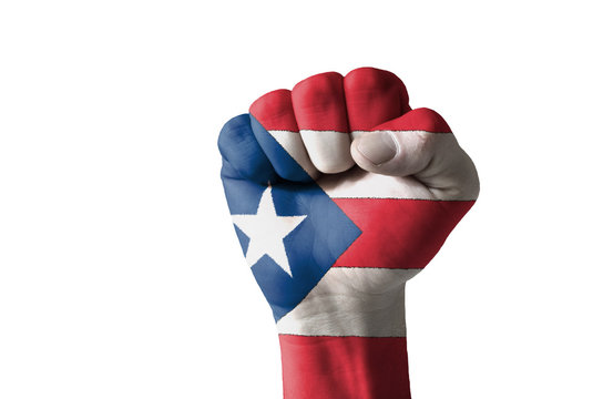 Fist painted in colors of puertorico flag