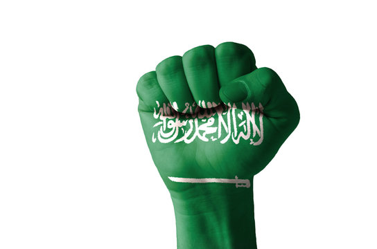 Fist painted in colors of saudi arabia flag
