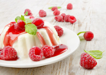 Delicious dessert with fresh berries and mint