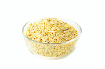 dry oat grains in the glass bowl