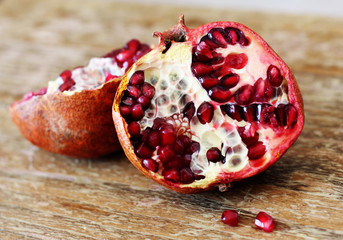 pomegranate fruit on wooden background