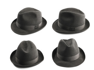 a dark greyfedora hat isolated on white - obrazy, fototapety, plakaty