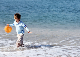4 years old boy at the sea