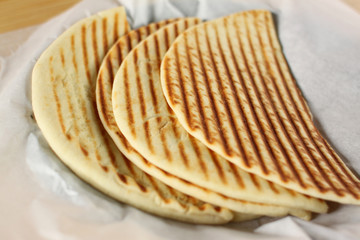 Plate of grilled pita bread.