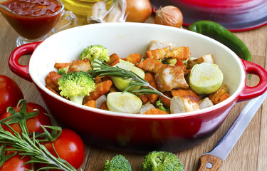 Delicious lecho with frankfurters and green peas