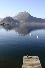 Annecy lake from Talloires harbour and wooden pontoon