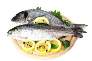 Fresh fishes with lemon, parsley and spice