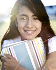 Young student embracing education