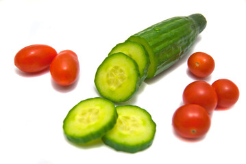 cucumber and cherry tomatoes on white