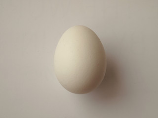 Japanese fresh egg close up on white background