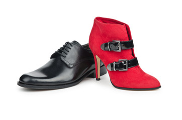 Male and female shoes on white