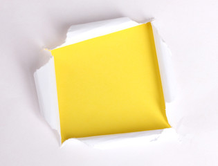 Torn paper  with yellow background