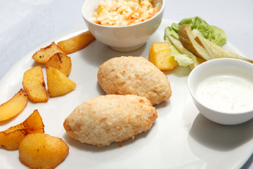 chicken cutlet with roasted potatoes