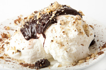 Vanilla ice cream with chocolate and nuts