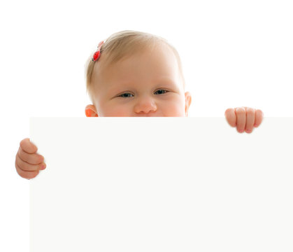 little baby behind white board