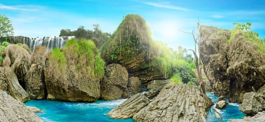 Beautiful panoramic landscape view of wild forest and waterfall
