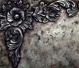metal plate background with flower decoration