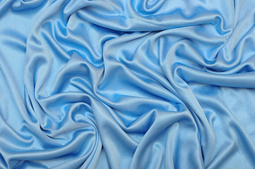 Fototapeta premium Smooth elegant blue silk can use as background