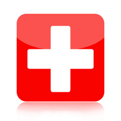 First aid medical button isolated on white