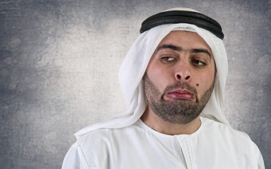 arabian businessman in a weird gesture expression - obrazy, fototapety, plakaty