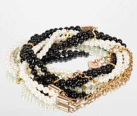 Pearl jewelry on black background