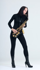 Fototapeta na wymiar woman with saxophone.