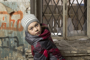 The young girl in the thrown building