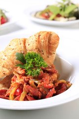 Vegetable stew with slices of sausage