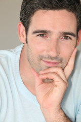 Naklejka premium Portrait of handsome 30-year-old man