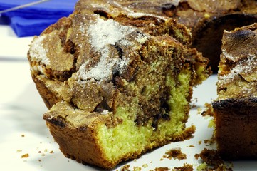 Slice of Italian chocolate cake called Ciambellone