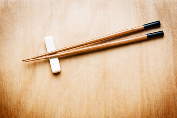 Oriental Chopstick on wooden table